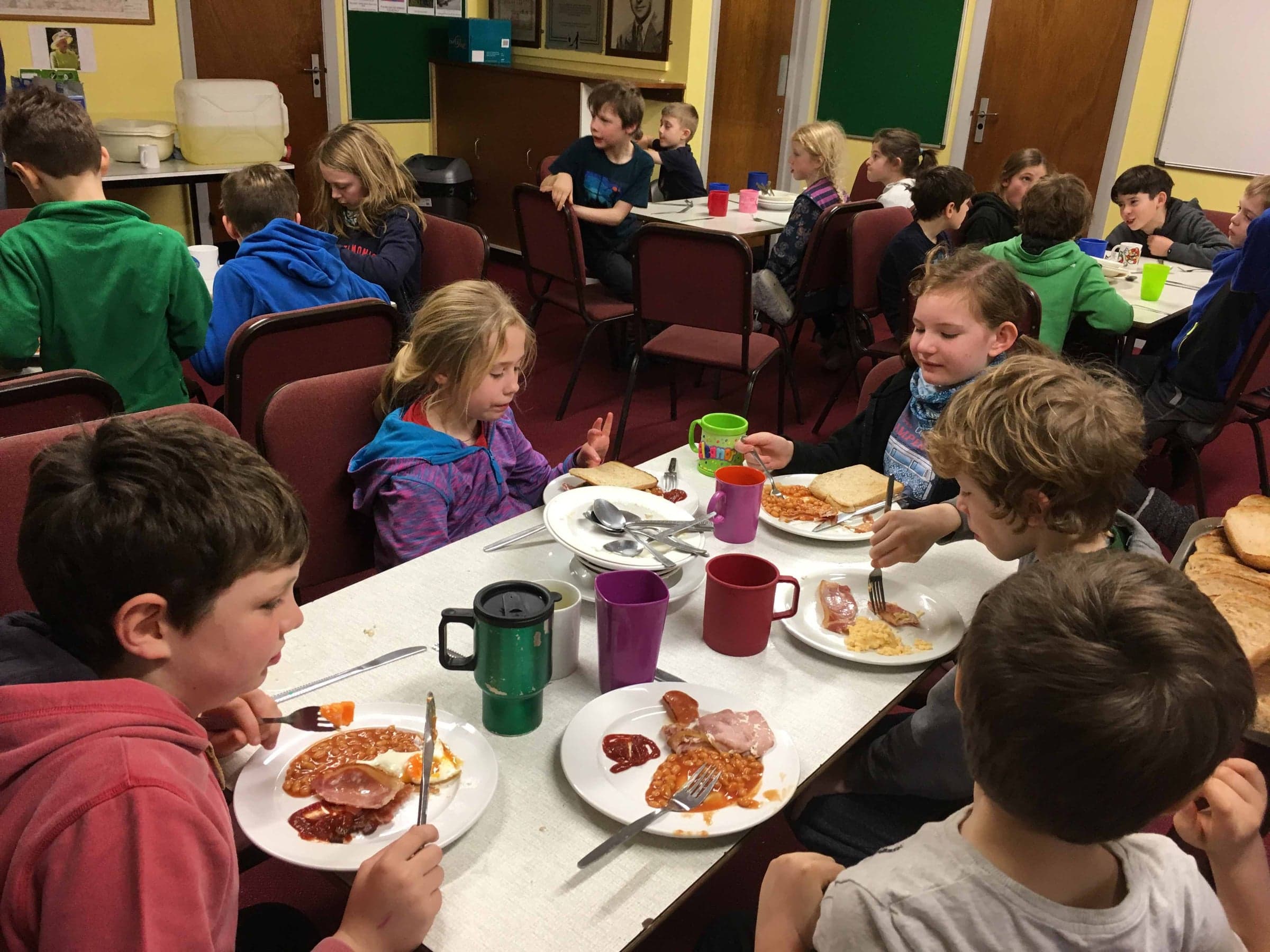 Feeding time — tucking into a meal together at camp.