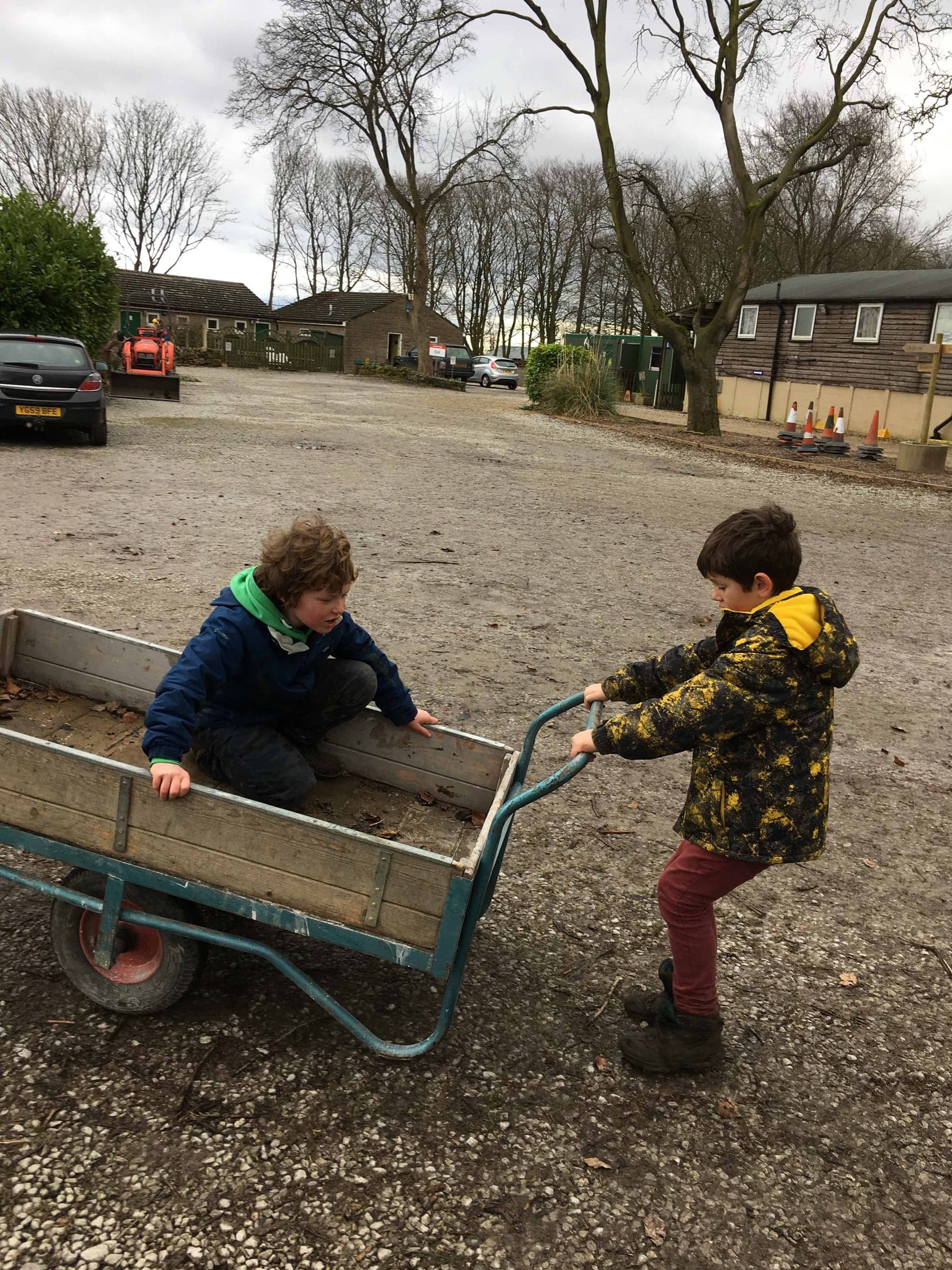 Cub Camp transport, 2nd Otley style — wheelbarrow duty.