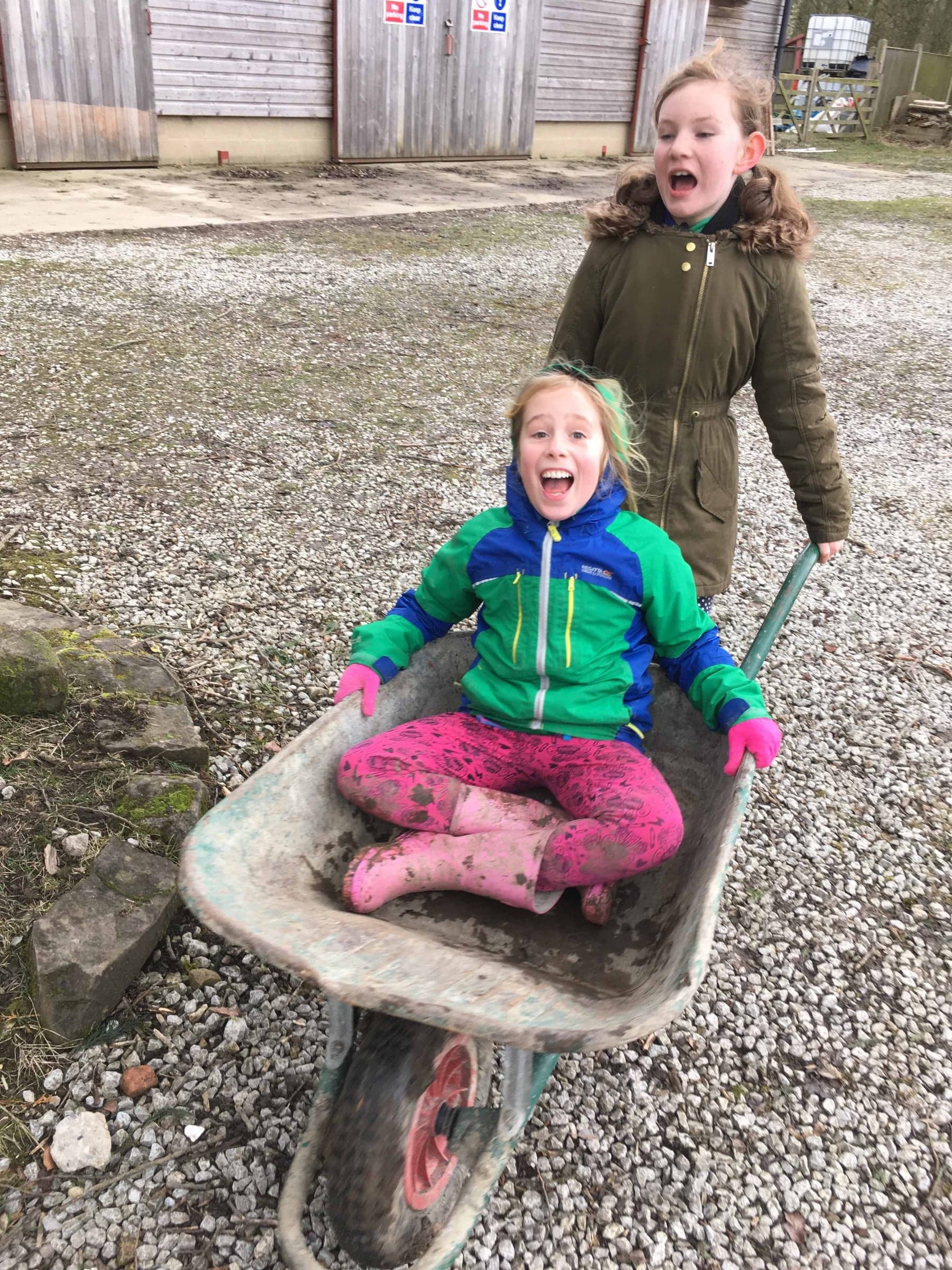 All aboard the wheelbarrow at Cub Camp, Bramhope.