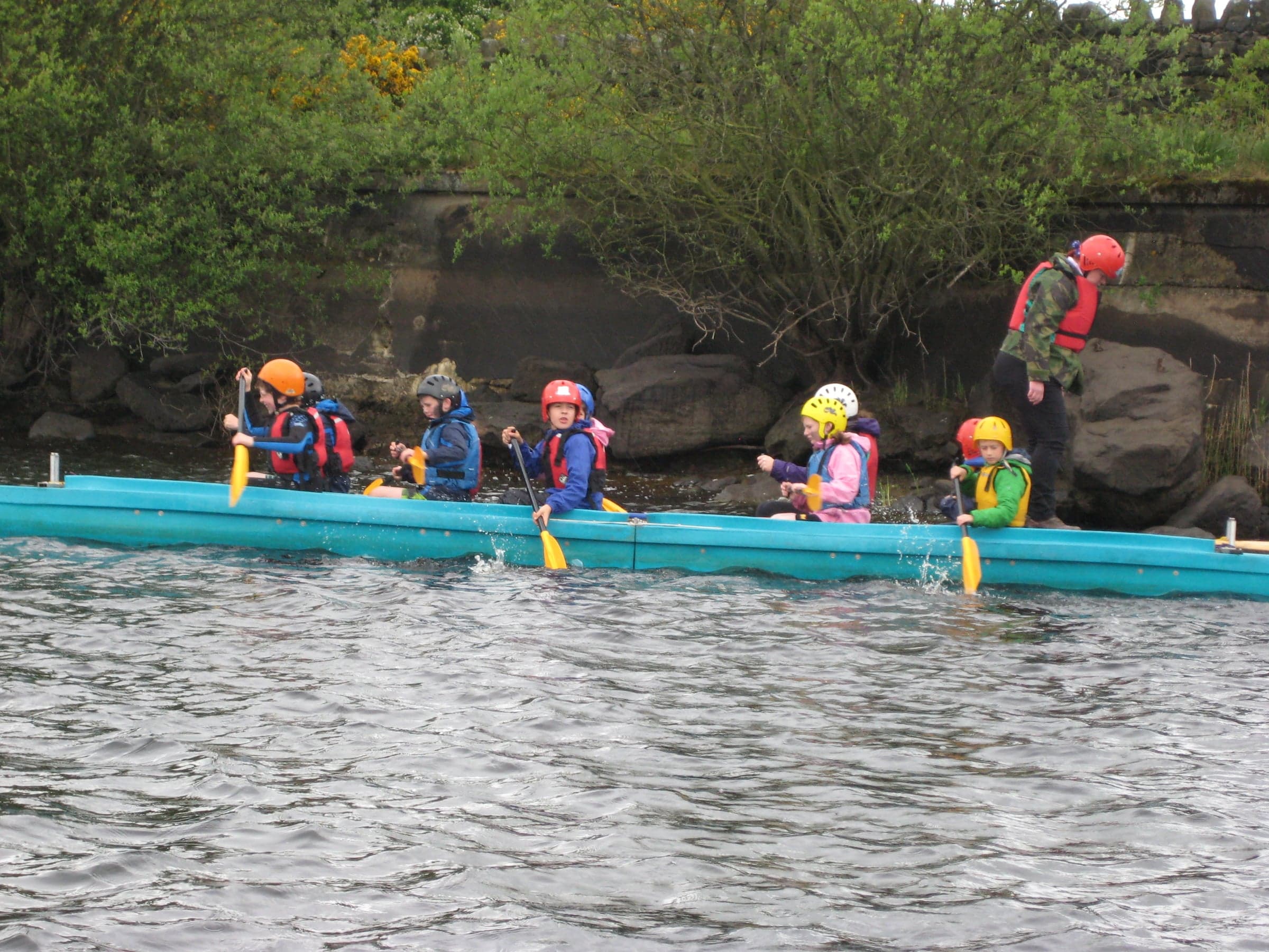 Out on the water in the long boats.